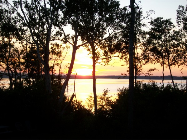 The sun sets over a tidal inlet in West Covehead, Prince Edward Island, in August. The sun sets over a tidal inlet in West Covehead, Prince Edward Island, in August.