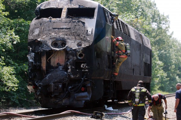 Firefighters work at the scene of an Amtrak passenger train that collided with a tractor-trailer in July 2011, in North Berwick. Firefighters work at the scene of an Amtrak passenger train that collided with a tractor-trailer in July 2011, in North Berwick.