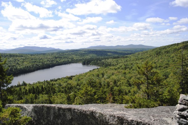 Harding Pond lies at the base of Turtle Ridge in the Nahmakanta Public Lands. In the distance on the left is Whitecap Mountain. On the right is the Barren/Chairback Mountain Range. Harding Pond lies at the base of Turtle Ridge in the Nahmakanta Public Lands. In the distance on the left is Whitecap Mountain. On the right is the Barren/Chairback Mountain Range.