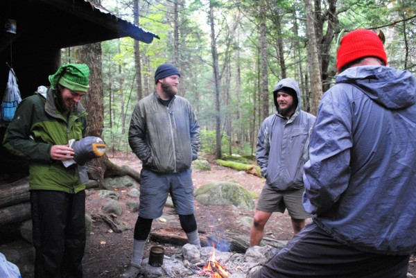 An unidentified thru-hiker, Martin "Giggle" Lieb (from left), "Mike D," Brian "Calculator" Snyder share a laugh over a warming fire at Hurd Brook lean-to on the Appalachian Trail, three miles south of Abol Bridge. After one more overnight, they'll fiinish their six-month thru-hike by hiking Katahdin. An unidentified thru-hiker, Martin "Giggle" Lieb (from left), "Mike D," Brian "Calculator" Snyder share a laugh over a warming fire at Hurd Brook lean-to on the Appalachian Trail, three miles south of Abol Bridge. After one more overnight, they'll fiinish their six-month thru-hike by hiking Katahdin.
