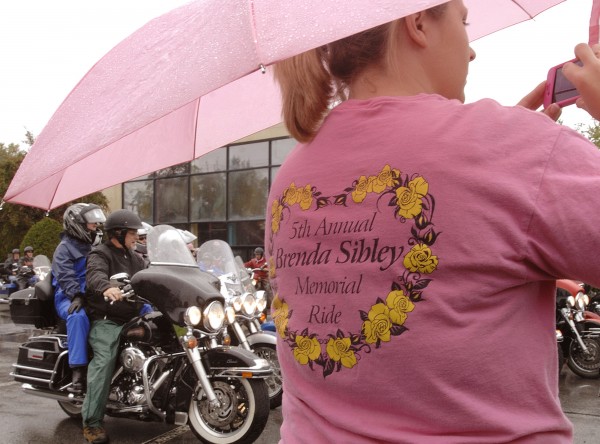 Angela Madden takes a snapshot of the riders gathered for the Brenda Sibley Memorial Ride for cancer awareness Saturday, Sept. 24, 2011, in Old Town. The riders raised money for the Lafayette Family Cancer Center as part of Eastern Maine Charities and CancerCare of Maine. Angela Madden takes a snapshot of the riders gathered for the Brenda Sibley Memorial Ride for cancer awareness Saturday, Sept. 24, 2011, in Old Town. The riders raised money for the Lafayette Family Cancer Center as part of Eastern Maine Charities and CancerCare of Maine.