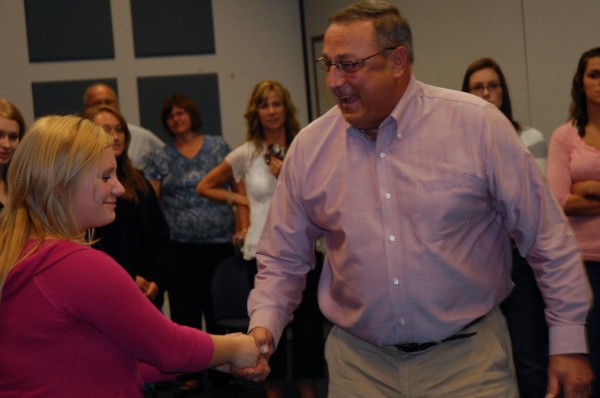 Gov. Paul LePage took a few moments to meet the students like Chelsea Minson of Winterville, who are participating in the Pleasant Street Academy at the University of Maine at Fort Kent. The pilot program allows high school juniors to take university courses toward both a university degree and their high school core requirements. Gov. Paul LePage took a few moments to meet the students like Chelsea Minson of Winterville, who are participating in the Pleasant Street Academy at the University of Maine at Fort Kent. The pilot program allows high school juniors to take university courses toward both a university degree and their high school core requirements.
