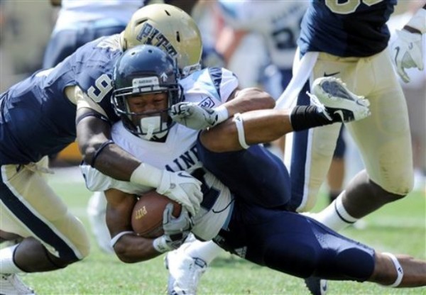 Pittsburgh defensive back Ray Vinopal (9) tackles Maine running back Roosevelt Boone during the second quarter of an NCAA football game Saturday, Sept. 10, 2011 in Pittsburgh. Pittsburgh defensive back Ray Vinopal (9) tackles Maine running back Roosevelt Boone during the second quarter of an NCAA football game Saturday, Sept. 10, 2011 in Pittsburgh.