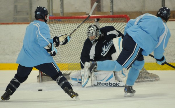 University of Maine men's hockey players (from left) Joey Diamond, Josh Seeley and Brian Flynn practice on Wednesday at the Penobscot Ice Arena in Brewer. Players have been working on captain's practices since the start of the school year, and coaches will be able to get on the ice with them in a limited way until the first official practice on Oct. 1. University of Maine men's hockey players (from left) Joey Diamond, Josh Seeley and Brian Flynn practice on Wednesday at the Penobscot Ice Arena in Brewer. Players have been working on captain's practices since the start of the school year, and coaches will be able to get on the ice with them in a limited way until the first official practice on Oct. 1.
