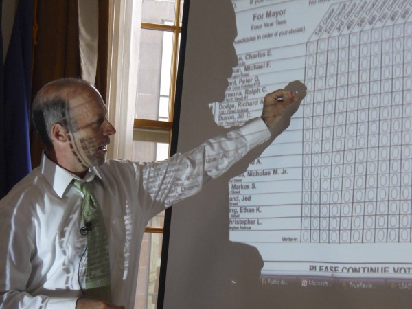 Caleb Kleppner of election consultant TrueBallot Inc. uses an overhead projector Thursday to illustrate how Portland residents will vote at the polls for mayor on Nov. 8. Kleppner held a primer on the new ranked choice voting system the city will use this year, the first year the city has held a popular election for its mayor position in nearly 90 years. Caleb Kleppner of election consultant TrueBallot Inc. uses an overhead projector Thursday to illustrate how Portland residents will vote at the polls for mayor on Nov. 8. Kleppner held a primer on the new ranked choice voting system the city will use this year, the first year the city has held a popular election for its mayor position in nearly 90 years.
