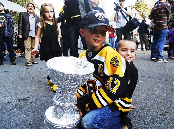 Levi Guay, 8, wears his Boston Bruins jersey Wednesday and holds his homemade replica Stanley Cup alongside Hunter Crabtree, 5, outside Krista's restaurant in Cornish, where the real Stanley Cup was due to arrive later in the night. Both boys came to the event from Hope. Levi Guay, 8, wears his Boston Bruins jersey Wednesday and holds his homemade replica Stanley Cup alongside Hunter Crabtree, 5, outside Krista's restaurant in Cornish, where the real Stanley Cup was due to arrive later in the night. Both boys came to the event from Hope.