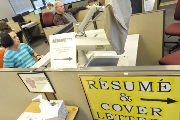 Kelly Boyer (left) and James Kent, both of Bangor, fill out online job applications at the Tri-County Career center in Bangor on Wednesday afternoon, Sept. 22, 2011. Boyer, a registered nurse, said she lost her job when the practice where she worked merged into a larger partnership. Kent, a commercial electrical supervisor, recently moved back to Maine due to a decrease in his line of work in Florida. Kelly Boyer (left) and James Kent, both of Bangor, fill out online job applications at the Tri-County Career center in Bangor on Wednesday afternoon, Sept. 22, 2011. Boyer, a registered nurse, said she lost her job when the practice where she worked merged into a larger partnership. Kent, a commercial electrical supervisor, recently moved back to Maine due to a decrease in his line of work in Florida.