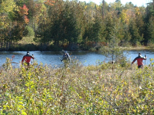 Maine State police and the dive team were searching for evidence both
in Carleton Stream and on land Thursday near the home of James Stile
on Route 23 in Sangerville. Stile was arrested last month and charged
with the armed robbery of a pharmacy in Bingham. Maine State police and the dive team were searching for evidence both
in Carleton Stream and on land Thursday near the home of James Stile
on Route 23 in Sangerville. Stile was arrested last month and charged
with the armed robbery of a pharmacy in Bingham.