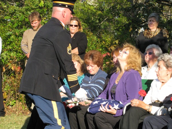 Robyn Campbell takes the folded American flag that had covered the casket of her husband, Don Campbell, Sunday afternoon during his interment ceremony at the Seiders Cemetery in Waldoboro. The pilot for Penobscot Island Air who died Wednesday in a crash on Matinicus was retired from the U.S. Army. Robyn Campbell takes the folded American flag that had covered the casket of her husband, Don Campbell, Sunday afternoon during his interment ceremony at the Seiders Cemetery in Waldoboro. The pilot for Penobscot Island Air who died Wednesday in a crash on Matinicus was retired from the U.S. Army.