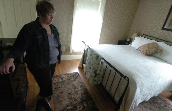 Bethany Foss, one of the family proprietors of the Chandler River Lodge in Jonesboro talks with the BDN about the several paranormal reports at the lodge, including a paranormal event in the Judah Chandler Room, where she is pictured. Bethany Foss, one of the family proprietors of the Chandler River Lodge in Jonesboro talks with the BDN about the several paranormal reports at the lodge, including a paranormal event in the Judah Chandler Room, where she is pictured.