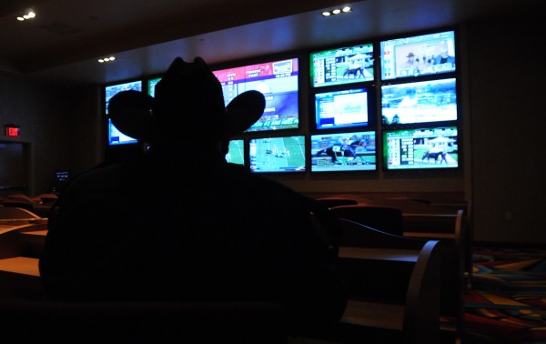 Dave Reynolds of Orrington sits in the simulcast racing hub at Hollywood Slots in Bangor on Monday Oct. 31, 2011. Reynolds likes the new larger screens and comfortable space to watch and bet on horse racing. He says he prefers races out of Chester, Penn. "It's a good race track. It's a fast track." Reynolds added. Dave Reynolds of Orrington sits in the simulcast racing hub at Hollywood Slots in Bangor on Monday Oct. 31, 2011. Reynolds likes the new larger screens and comfortable space to watch and bet on horse racing. He says he prefers races out of Chester, Penn. "It's a good race track. It's a fast track." Reynolds added.