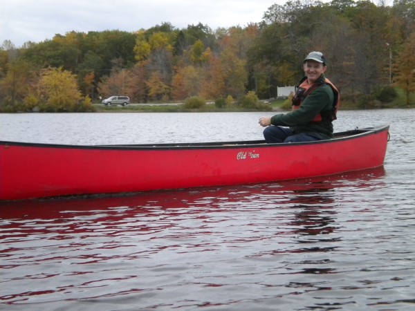 Robert Causey gets his red Old Town Scout canoe under way at Pushaw Lake’s Gould Landing on his birthday outing last Wednesday. Robert Causey gets his red Old Town Scout canoe under way at Pushaw Lake’s Gould Landing on his birthday outing last Wednesday.