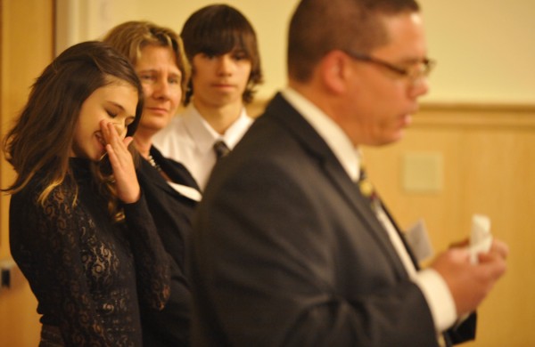 Nicole Maines (left), 14, tears up as her father, Wayne Maines, delivers a stirring address about his family's love and fortitude while helping Nicole with her life as a transgender youth. The family received the 2011 ACLU of Maine's Roger Baldwin Award for their courage and perseverance in helping to defeat the recent anti-transgender legislation in the Maine State House. Next to Nicole are her mother, Kelly Maines, and her twin brother, Jonas. Nicole Maines (left), 14, tears up as her father, Wayne Maines, delivers a stirring address about his family's love and fortitude while helping Nicole with her life as a transgender youth. The family received the 2011 ACLU of Maine's Roger Baldwin Award for their courage and perseverance in helping to defeat the recent anti-transgender legislation in the Maine State House. Next to Nicole are her mother, Kelly Maines, and her twin brother, Jonas.