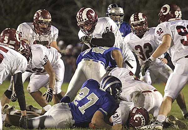 Aaron Huntington (64) of Bangor stops Lawrence running back Shaun Carroll Jr. during the first half of Friday night's PTC Class A final in Fairfield. Lawrence rolled to a 40-14 victory over Bangor, which had won the last two PTC titles.
Aaron Huntington (64) of Bangor stops Lawrence running back Shaun Carroll Jr. during the first half of Friday night's PTC Class A final in Fairfield. Lawrence rolled to a 40-14 victory over Bangor, which had won the last two PTC titles.