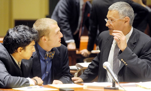 Kush Mahan (from left) and Mark Stehlik listen to attorney Bill Cote in Androscoggin County Superior Court on Tuesday. Kush Mahan (from left) and Mark Stehlik listen to attorney Bill Cote in Androscoggin County Superior Court on Tuesday.