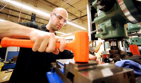 Kyle Forsythe works in a precision machine technology lab during his second year at Central Maine Community College on Wednesday. Many employers in the industry of precision machining are saying it's difficult to find skilled workers in the trade and are offering to pay for schooling, along with other perks. Kyle Forsythe works in a precision machine technology lab during his second year at Central Maine Community College on Wednesday. Many employers in the industry of precision machining are saying it's difficult to find skilled workers in the trade and are offering to pay for schooling, along with other perks.