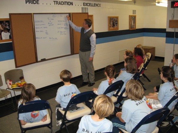 University of Maine women's basketball coach Richard Barron talks about Saturday's game with a group of youngsters during a Cub Club Huddle session in the UMaine locker room prior to the Dead River Co. Classic title game at Alfond Arena. University of Maine women's basketball coach Richard Barron talks about Saturday's game with a group of youngsters during a Cub Club Huddle session in the UMaine locker room prior to the Dead River Co. Classic title game at Alfond Arena.
