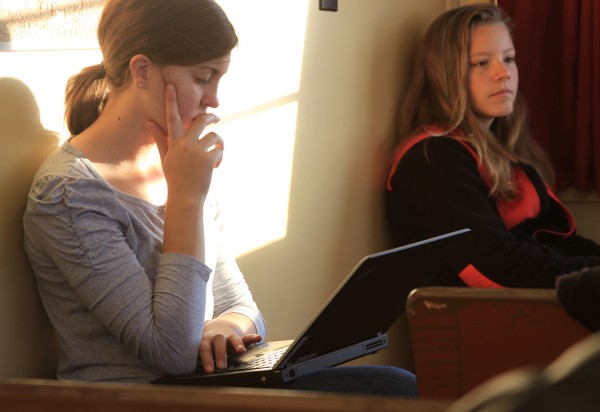 Madison Cook, a 9th grade magnet student from Belfast, spends the ferry commute on her laptop preparing for the day at Isleboro Central School. Madison Cook, a 9th grade magnet student from Belfast, spends the ferry commute on her laptop preparing for the day at Isleboro Central School.