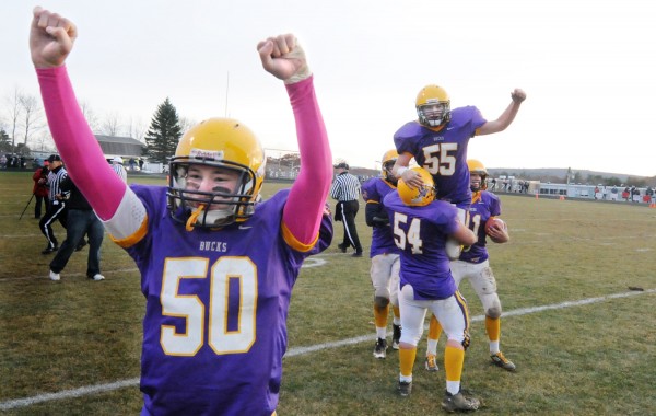 Mike York (50), Damon Klenedinst (54), James Comtois (55), Mike Cummings (11) and other Golden Buck teammates celebrate after defeating Orono High School in their Eastern Maine Class C LTC Championship game in Bucksport Saturday afternoon, Nov. 12, 2011. Mike York (50), Damon Klenedinst (54), James Comtois (55), Mike Cummings (11) and other Golden Buck teammates celebrate after defeating Orono High School in their Eastern Maine Class C LTC Championship game in Bucksport Saturday afternoon, Nov. 12, 2011.