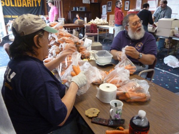 Loren and Sandy Snow (foreground) of Surry help package food for Thanksgiving baskets on Saturday, Nov. 19, 2011 at the Solidarity Center in Brewer. Loren and Sandy Snow (foreground) of Surry help package food for Thanksgiving baskets on Saturday, Nov. 19, 2011 at the Solidarity Center in Brewer.