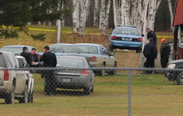 Maine State Police detectives and other local law enforcement personnel are seen at the Piscataquis Valley Fairgrounds in Dover-Foxcroft on Tuesday, Nov. 29, 2011, to investigate the police shooting of Michael Curtis of Sangerville. Maine State Police detectives and other local law enforcement personnel are seen at the Piscataquis Valley Fairgrounds in Dover-Foxcroft on Tuesday, Nov. 29, 2011, to investigate the police shooting of Michael Curtis of Sangerville.