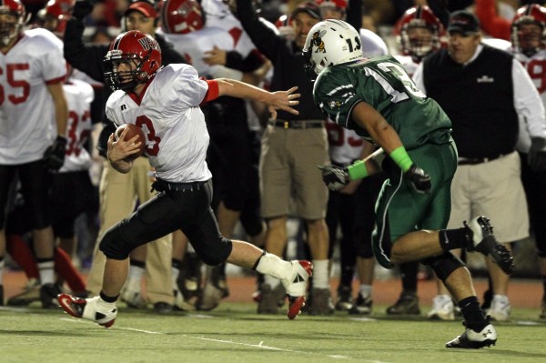 Paul McDonough returns an intercption late in the fourth quarter during the Class B state championship football game against Leavitt, Saturday, Nov. 19, 2011, at Fitzpatrick Stadium in Portland. Paul McDonough returns an intercption late in the fourth quarter during the Class B state championship football game against Leavitt, Saturday, Nov. 19, 2011, at Fitzpatrick Stadium in Portland.