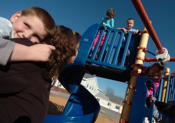 Leroy H. Smith School fourth-grader Dominic Coolidge, 9, piggybacks on Maggie Mourkas, a teacher with Bangor's Y-Works during Y-Works after-school program at the school Wednesday, Nov. 2, 2011. Behind them on the school's playscape are first-grader Emma Roy (left), 6, first-grader Brent Gardner, 6, and kindergartener Pheona El Hajj (right), 5. Leroy H. Smith School fourth-grader Dominic Coolidge, 9, piggybacks on Maggie Mourkas, a teacher with Bangor's Y-Works during Y-Works after-school program at the school Wednesday, Nov. 2, 2011. Behind them on the school's playscape are first-grader Emma Roy (left), 6, first-grader Brent Gardner, 6, and kindergartener Pheona El Hajj (right), 5.