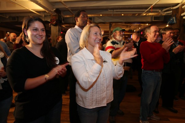 Yes On 1 supporters Genevieve Lysen (left) and Melanie Collins (center) applaud as they listen to speakers Tuesday, Nov. 8, 2011, in Portland. Yes On 1 supporters Genevieve Lysen (left) and Melanie Collins (center) applaud as they listen to speakers Tuesday, Nov. 8, 2011, in Portland.