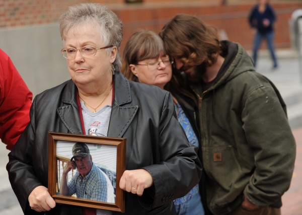 Ruth Trask, wife of David Task, displays a photograph of her late husband outside the Penobscot Judicial Center in Bangor on Friday, November 18, 2011. Ruth Trask, wife of David Task, displays a photograph of her late husband outside the Penobscot Judicial Center in Bangor on Friday, November 18, 2011.