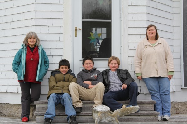 Teacher Paula Greatorex (from left), Andrew Barter, Michael Barter, Alex Tully and education technician Lisa Turner make up the entire population of Isle au Haut's one-room schoolhouse. Teacher Paula Greatorex (from left), Andrew Barter, Michael Barter, Alex Tully and education technician Lisa Turner make up the entire population of Isle au Haut's one-room schoolhouse.