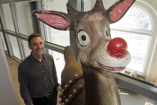 Peter Carini stands next to a full-size Rudolph the Red-Nosed Reindeer, part of a special collection at Dartmouth College, on Tuesday, Dec. 20, 2011 in Hanover, N.H. Peter Carini stands next to a full-size Rudolph the Red-Nosed Reindeer, part of a special collection at Dartmouth College, on Tuesday, Dec. 20, 2011 in Hanover, N.H.