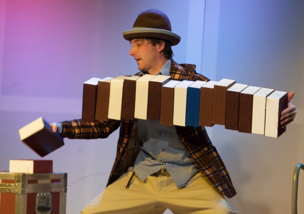 Comedian Daniel Forlano adds another box to the end of a horizontal stack in Acorn Productions' annual Christmas week festival of physical comedy, Phyzgig, at Space Gallery in Portland on Tuesday. The festival features a dozen shows running through the end of the week Comedian Daniel Forlano adds another box to the end of a horizontal stack in Acorn Productions' annual Christmas week festival of physical comedy, Phyzgig, at Space Gallery in Portland on Tuesday. The festival features a dozen shows running through the end of the week