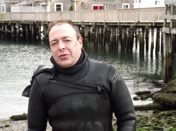 Gary Sredzienski of Kittery talks with a crowd after swimming from Owls Head Lighthouse to the Breakwater Lighthouse in Rockland to Middle Pier in Rockland Harbor on Saturday. Gary Sredzienski of Kittery talks with a crowd after swimming from Owls Head Lighthouse to the Breakwater Lighthouse in Rockland to Middle Pier in Rockland Harbor on Saturday.