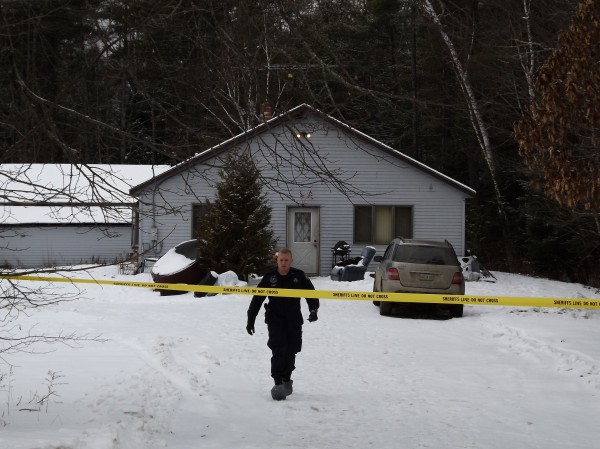 A member of the Maine State Police walks toward Whitehouse Road in Vassalboro on Tuesday, Jan. 17, 2012. Rafael Encarnacion of Bronx, N.Y., was shot inside 38 Whitehouse Road by homeowner Joseph Gagnon after an argument early Tuesday morning. A member of the Maine State Police walks toward Whitehouse Road in Vassalboro on Tuesday, Jan. 17, 2012. Rafael Encarnacion of Bronx, N.Y., was shot inside 38 Whitehouse Road by homeowner Joseph Gagnon after an argument early Tuesday morning.