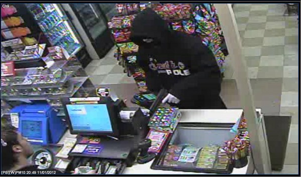An armed man wearing a ski mask robbed the Cumberland Farms store on Pine Street in Portland on Jan. 11, 2012, according to Portland police. The suspect, a white male standing 6 feet tall and weighing 225 pounds, remained at large. An armed man wearing a ski mask robbed the Cumberland Farms store on Pine Street in Portland on Jan. 11, 2012, according to Portland police. The suspect, a white male standing 6 feet tall and weighing 225 pounds, remained at large.