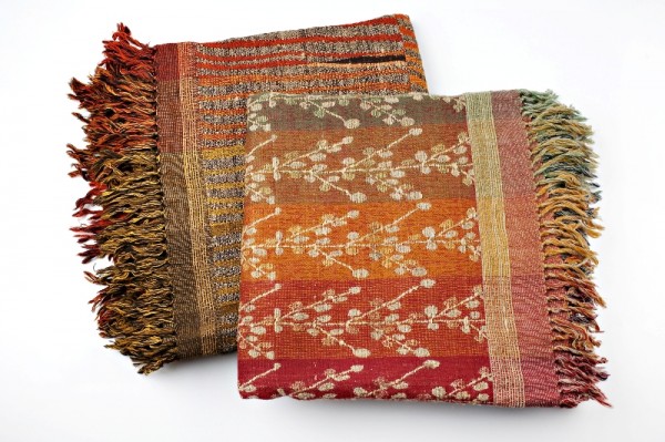 What feels better than curling up under a nice blanket? Indian weaver Neeru Kumar makes colorful hand-woven throws out of wool and silk. What feels better than curling up under a nice blanket? Indian weaver Neeru Kumar makes colorful hand-woven throws out of wool and silk.
