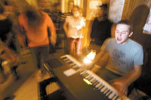 ERIC STEVENSON of Pocket Vinyl sings and plays at the keyboard while listeners groove at the Bombshelter on Saturday night in Brunswick. The informal venue is booked and operated by resident Nick Dentico. ERIC STEVENSON of Pocket Vinyl sings and plays at the keyboard while listeners groove at the Bombshelter on Saturday night in Brunswick. The informal venue is booked and operated by resident Nick Dentico.