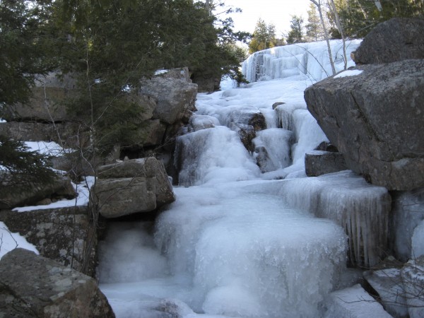 The Canon Brook Trail in Acadia is renowned for ice. Don't try to ascend this trail unless you're equipped with aggressive mountaineering crampons. Some trails in Acadia become impassable due to ice build-up. The Canon Brook Trail in Acadia is renowned for ice. Don't try to ascend this trail unless you're equipped with aggressive mountaineering crampons. Some trails in Acadia become impassable due to ice build-up.