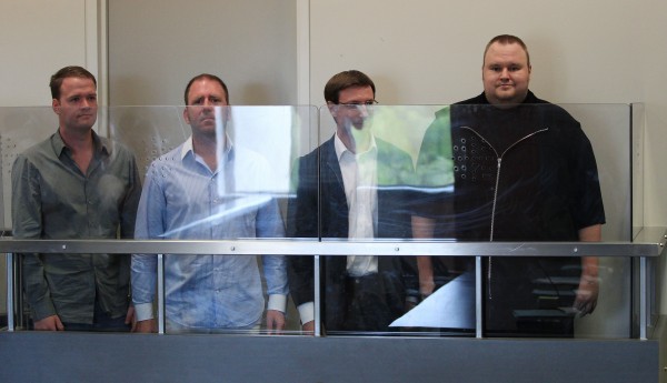 Megaupload.com employees Bram van der Kolk, also known as Bramos ( from left); Finn Batato; Mathias Ortmann; and founder, former CEO and current chief innovation officer of Megaupload.com Kim Dotcom, also known as Kim Schmitz and Kim Tim Jim Vestor, appear in North Shore District Court in Auckland, New Zealand on Friday, Jan. 20, 2012. The four appeared in court in relation to arrests made to Megaupload.com, which is linked to a U.S. investigation into international copyright infringement and money laundering. Megaupload.com employees Bram van der Kolk, also known as Bramos ( from left); Finn Batato; Mathias Ortmann; and founder, former CEO and current chief innovation officer of Megaupload.com Kim Dotcom, also known as Kim Schmitz and Kim Tim Jim Vestor, appear in North Shore District Court in Auckland, New Zealand on Friday, Jan. 20, 2012. The four appeared in court in relation to arrests made to Megaupload.com, which is linked to a U.S. investigation into international copyright infringement and money laundering.