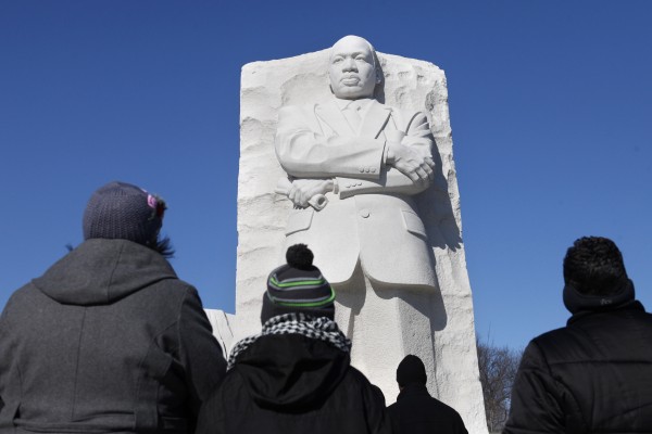 Visitors gather at the Martin Luther King, Jr. Memorial in Washington on Sunday, Jan. 15, 2012, for a National Park Service wreath laying ceremony at the monument of the civil rights leader in observance of his of 83rd birthday-anniversary. Visitors gather at the Martin Luther King, Jr. Memorial in Washington on Sunday, Jan. 15, 2012, for a National Park Service wreath laying ceremony at the monument of the civil rights leader in observance of his of 83rd birthday-anniversary.