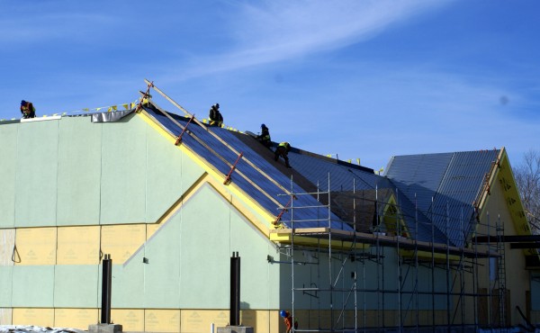 Workers from Hahnel Bros. Co. of Lewiston work of the roof of the Oxford Casino on Thursday. Community Development Director Scott Smith said construction is on schedule thanks to a mild December. Workers from Hahnel Bros. Co. of Lewiston work of the roof of the Oxford Casino on Thursday. Community Development Director Scott Smith said construction is on schedule thanks to a mild December.