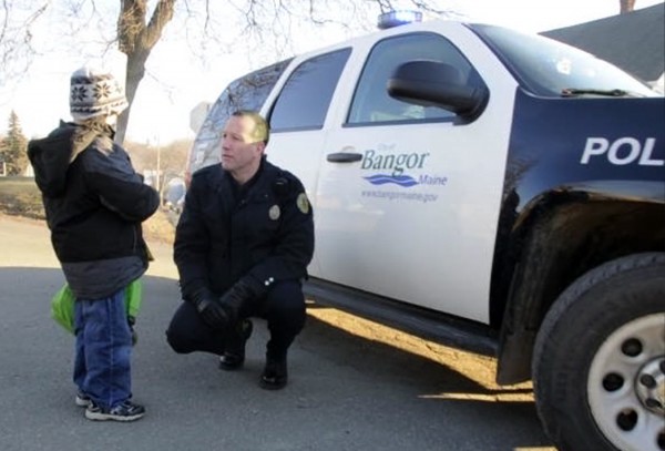Five-year-old Luke Saucier, a kindergartner at Vine Street School in Bangor, talks with Bangor Police Community Relations Officer Jason McAmbley who chauffered him to school in a patrol vehicle on Monday, Jan. 9, 2012. Five-year-old Luke Saucier, a kindergartner at Vine Street School in Bangor, talks with Bangor Police Community Relations Officer Jason McAmbley who chauffered him to school in a patrol vehicle on Monday, Jan. 9, 2012.