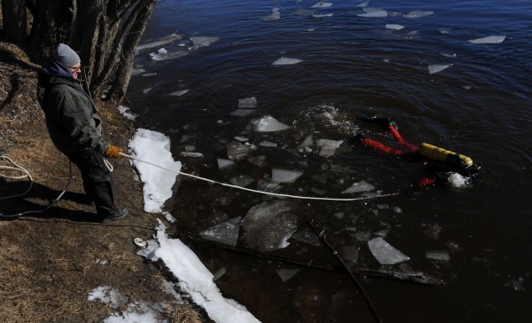 Members of the Maine State Police Dive Team search the waters of the Kennebec River just south of Waterville on Wednesday, Jan.11, 2012, for 20-month-old Ayla Reynolds. Members of the Maine State Police Dive Team search the waters of the Kennebec River just south of Waterville on Wednesday, Jan.11, 2012, for 20-month-old Ayla Reynolds.
