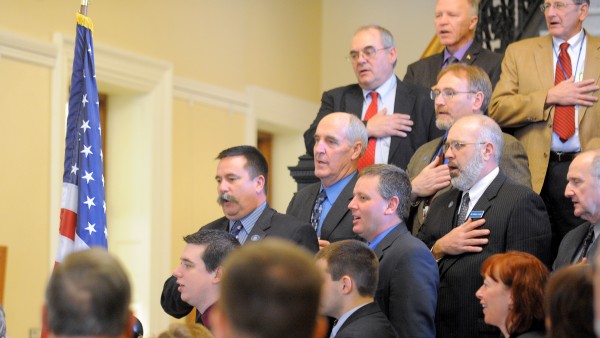 Maine legislators recite the Pledge of Allegiance during a signing ceremony for "A Call to Prayer for Maine" in the Hall of Flags at the Maine State House in Augusta Tuesday. Maine legislators recite the Pledge of Allegiance during a signing ceremony for "A Call to Prayer for Maine" in the Hall of Flags at the Maine State House in Augusta Tuesday.
