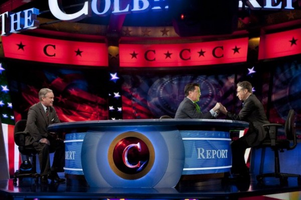 Stephen Colbert, center, and Jon Stewart, right, hold hands during The Colbert Report, as Trevor Potter looks on Thursday in New York. During the episode, Colbert legally transferred his super political action committee to Stewart, his friend and Comedy Central cohort. Stephen Colbert, center, and Jon Stewart, right, hold hands during The Colbert Report, as Trevor Potter looks on Thursday in New York. During the episode, Colbert legally transferred his super political action committee to Stewart, his friend and Comedy Central cohort.
