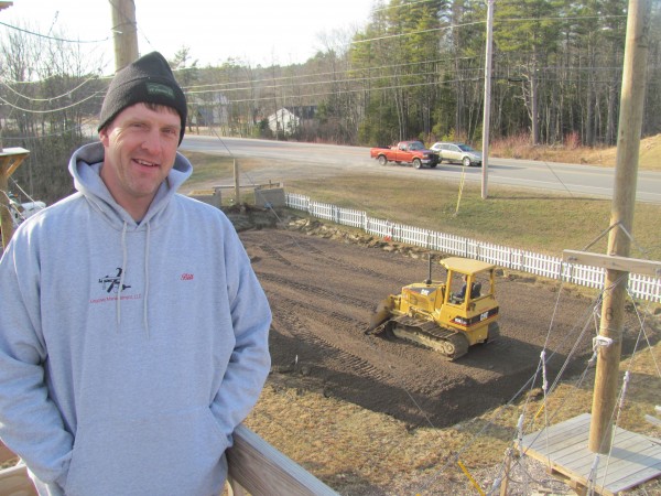 Bill King III, one of the owners of the Monkey C Monkey Do outdoor adventure center, stands high above the site of a new year-round ice skating rink under construction at the Wiscasset business. The rink, which will be one of the only synthetic ice rinks in New England, will be open by mid-February, said King. Bill King III, one of the owners of the Monkey C Monkey Do outdoor adventure center, stands high above the site of a new year-round ice skating rink under construction at the Wiscasset business. The rink, which will be one of the only synthetic ice rinks in New England, will be open by mid-February, said King.