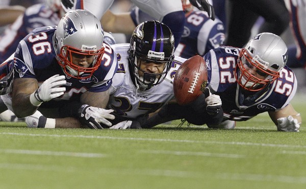 Baltimore Ravens' Emanuel Cook (37) grabs for a loose ball between New England Patriots' Lousaka Polite (36) and Dane Fletcher after it was fumbled by Patriots' Danny Woodhead on a kick return during the second half of the AFC championship NFL football game Sunday, Jan. 22, 2012, in Foxborough, Mass. Baltimore Ravens' Emanuel Cook (37) grabs for a loose ball between New England Patriots' Lousaka Polite (36) and Dane Fletcher after it was fumbled by Patriots' Danny Woodhead on a kick return during the second half of the AFC championship NFL football game Sunday, Jan. 22, 2012, in Foxborough, Mass.