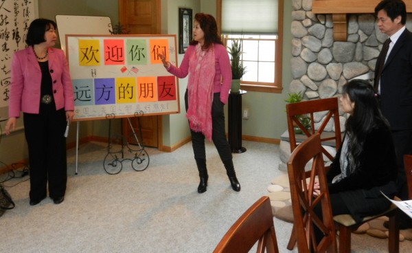 From left: Jing Xhang (president of Chinese Language and Culture Center in Bangor), Chunfang Tian Jun (director of education Heilongjiang Province in China), Liu Tong (liason for University of Heilongjiang) and Chang Quansheng (consul of the Consulate General of the People's Republic of China in New York) gathered at Xhang's home in Bangor during their tour of Bangor and surrounding areas on Wednesday, Feb. 22, 2012. They are involved in a cultural exchange program between the U.S. and China. From left: Jing Xhang (president of Chinese Language and Culture Center in Bangor), Chunfang Tian Jun (director of education Heilongjiang Province in China), Liu Tong (liason for University of Heilongjiang) and Chang Quansheng (consul of the Consulate General of the People's Republic of China in New York) gathered at Xhang's home in Bangor during their tour of Bangor and surrounding areas on Wednesday, Feb. 22, 2012. They are involved in a cultural exchange program between the U.S. and China.
