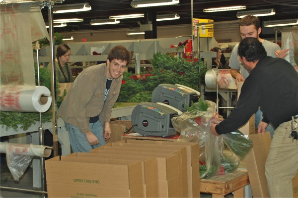 Workers at Whitney Wreath in Whitneyville are busy preparing and packaging Christmas wreaths during the 2011 holiday season. Workers at Whitney Wreath in Whitneyville are busy preparing and packaging Christmas wreaths during the 2011 holiday season.