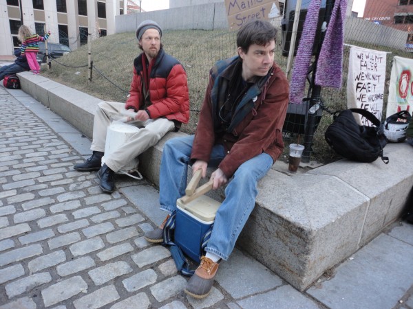 Brian Leonard, executive producer of OccupyMaine's new television show, and fellow occupier Sam Swenson drum beats on plastic containers Wednesday afternoon, Feb. 22, 2012, in Monument Square. The group's rally to celebrate President George Washington's birthday came more than a week after its tent community in Lincoln Park in Portland was taken down. Brian Leonard, executive producer of OccupyMaine's new television show, and fellow occupier Sam Swenson drum beats on plastic containers Wednesday afternoon, Feb. 22, 2012, in Monument Square. The group's rally to celebrate President George Washington's birthday came more than a week after its tent community in Lincoln Park in Portland was taken down.